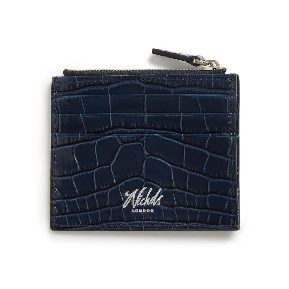 Navy blue crocodile pattern cardholder with 'Nichols London' branding on a white background