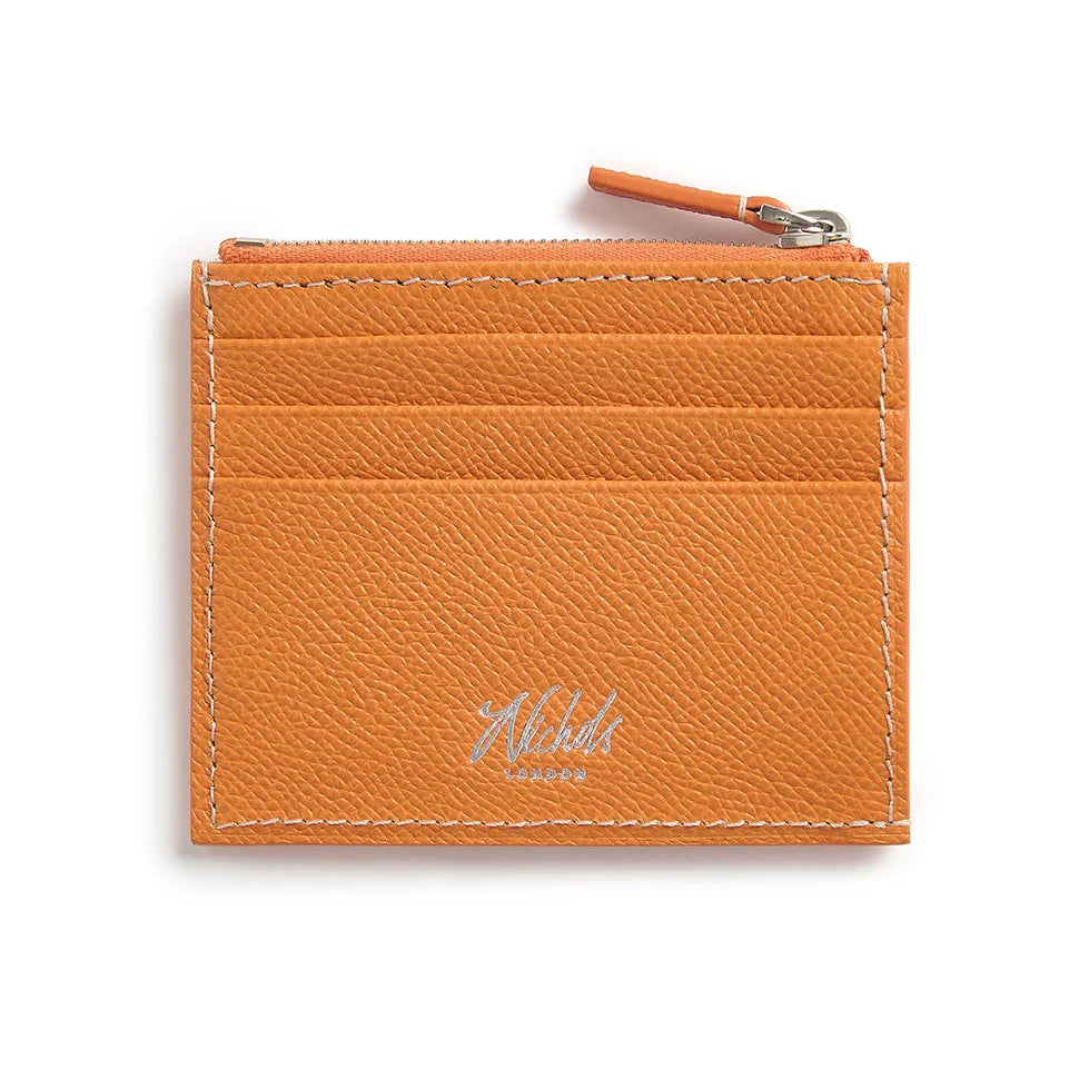 Orange leather cardholder with Nichols London branding on a white background