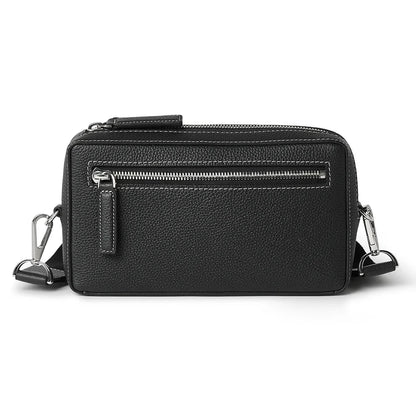 Black crossbody bag on a white background