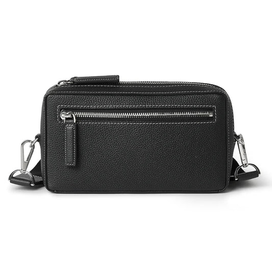 Black crossbody bag on a white background
