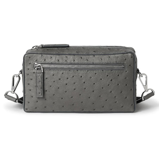 Gray textured crossbody bag on a white background