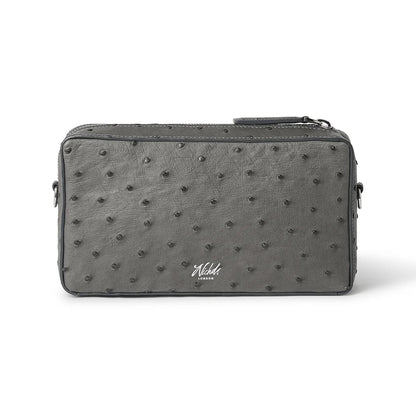 Gray textured pouch with a Nichols London logo on a white background